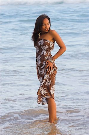 Caribbean model standing in the water at the beach Foto de stock - Super Valor sin royalties y Suscripción, Código: 400-04462695