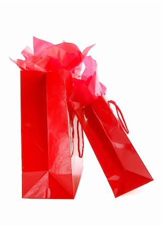 Two red shopping bags isolated on white background Stock Photo - Budget Royalty-Free & Subscription, Code: 400-04463088