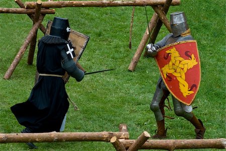 A fight of medieval footed knights during a tournament Stockbilder - Microstock & Abonnement, Bildnummer: 400-04463664