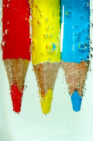 coloured pencil in sparkling water Foto de stock - Royalty-Free Super Valor e Assinatura, Número: 400-04463849