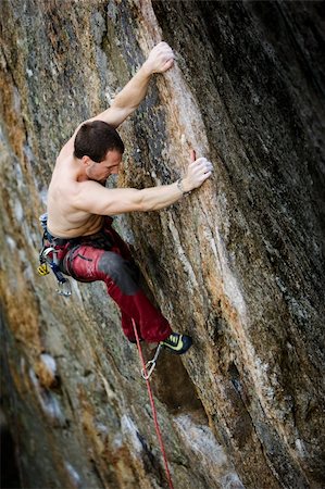 A male rock climber on a steep rock face. Photographie de stock - Aubaine LD & Abonnement, Code: 400-04463876