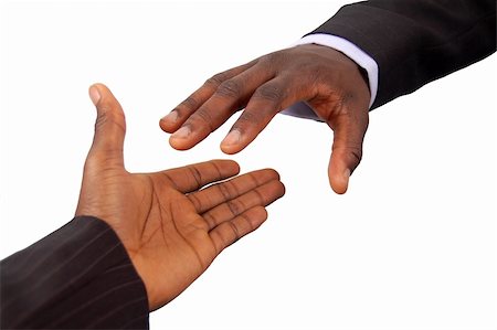 This is an image of a pair of black business hands reaching out to each other. Metaphor for contract agreement, business help, employment opportunities etc.. Fotografie stock - Microstock e Abbonamento, Codice: 400-04474301