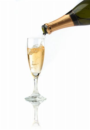 simsearch:400-03962535,k - Pouring a champagne flute for celebration time Stockbilder - Microstock & Abonnement, Bildnummer: 400-04474740