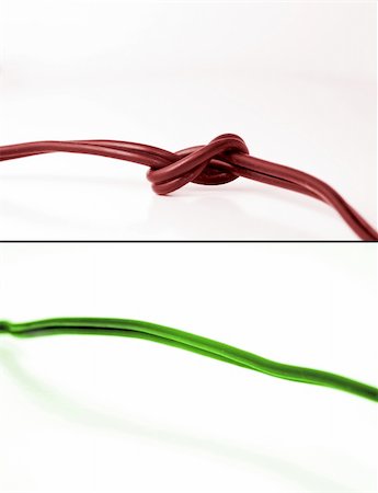 first responder - Conceptual photo showing two scenarios: problem and fixed problem. On top is red cable with knot - indicating problems. On bottom is green cable indicating problem free communication. Photographie de stock - Aubaine LD & Abonnement, Code: 400-04474762