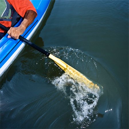 saladar - African American male arm paddling kayak. Photographie de stock - Aubaine LD & Abonnement, Code: 400-04475190