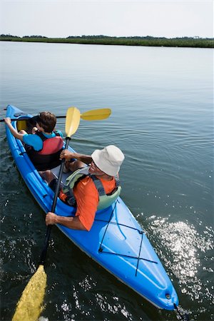 simsearch:400-03943979,k - Back view of African American middle-aged couple paddling kayak. Foto de stock - Super Valor sin royalties y Suscripción, Código: 400-04475192