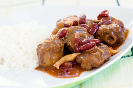 simsearch:400-04440947,k - Caribbean style curried Oxtail stew served with rice. Shallow DOF. Fotografie stock - Microstock e Abbonamento, Codice: 400-04475210