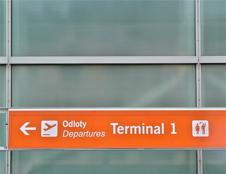 Orange departing flights sign with arrow Stock Photo - Budget Royalty-Free & Subscription, Code: 400-04475348