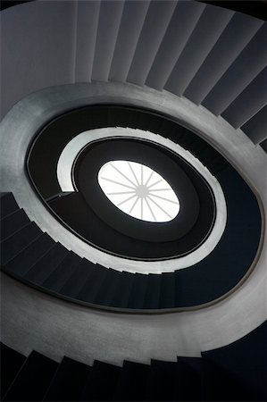 simsearch:400-04407766,k - Spiral staircase  / stairways going up / A spiral staircase leading up Fotografie stock - Microstock e Abbonamento, Codice: 400-04475414
