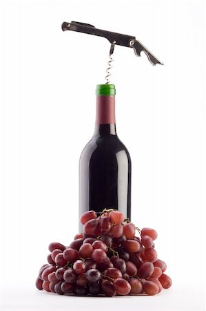 simsearch:400-04919991,k - A Bottle of red wine with a corkscrew and grapes on a plain background Foto de stock - Royalty-Free Super Valor e Assinatura, Número: 400-04475899