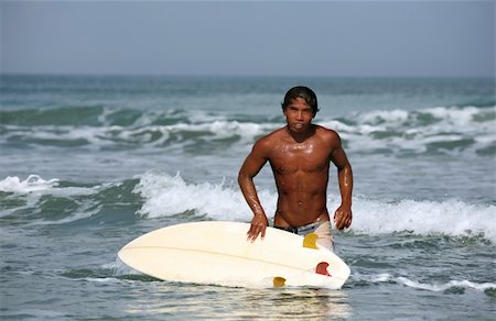 simsearch:400-04108589,k - Portrait young men - the surfer in ocean. Bali Foto de stock - Super Valor sin royalties y Suscripción, Código: 400-04475993