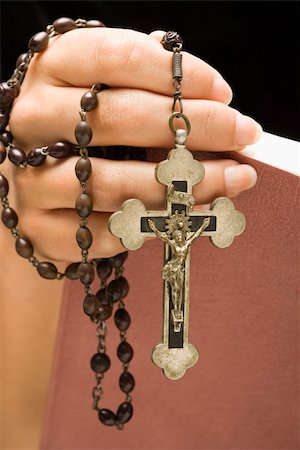 simsearch:400-05080477,k - Woman holding Holy Bible open with rosary and crucifix in hand. Stock Photo - Budget Royalty-Free & Subscription, Code: 400-04476083