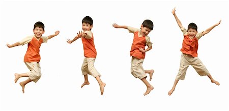 The Boy jumps on white background. Fotografie stock - Microstock e Abbonamento, Codice: 400-04476238