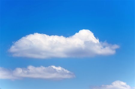 Beautiful white clouds and blue sky on a sunny day Stock Photo - Budget Royalty-Free & Subscription, Code: 400-04476290