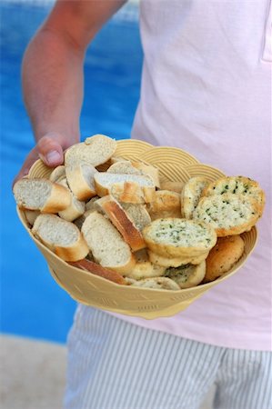 pane all'aglio - a basket of garlic bread for lunch Fotografie stock - Microstock e Abbonamento, Codice: 400-04476362