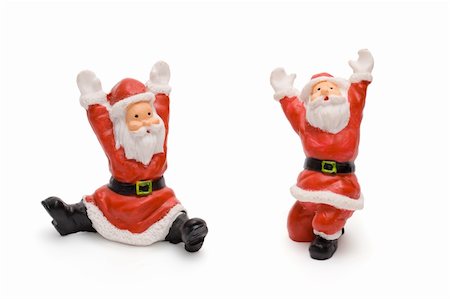 Santa Claus figurines isolated on white background Foto de stock - Super Valor sin royalties y Suscripción, Código: 400-04476720
