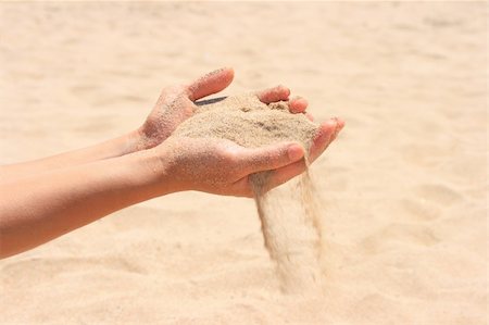 skin problem - Sand running through hands Stock Photo - Budget Royalty-Free & Subscription, Code: 400-04476730