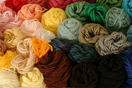 Practical and colorful storage of skeins of yarn being used for different knitting, crocheting, and needle-point canvas projects. Photographie de stock - Aubaine LD & Abonnement, Code: 400-04476825