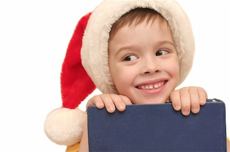The happy BOY In the NEW YEAR'S CAP on a white background Stockbilder - Microstock & Abonnement, Bildnummer: 400-04476899