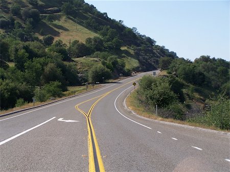 Mountain Highway with Turnoff Stockbilder - Microstock & Abonnement, Bildnummer: 400-04477470