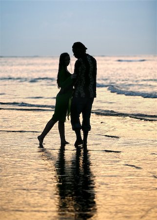 Couple on sunset. Coast of the Indian ocean Foto de stock - Super Valor sin royalties y Suscripción, Código: 400-04478037