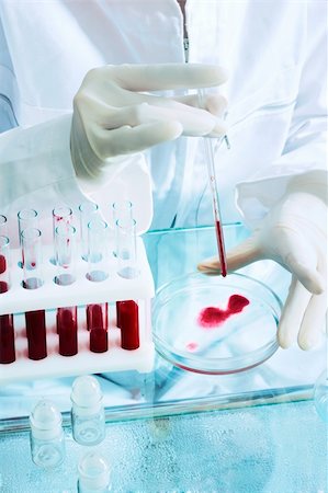 doctor making experiment with blood in the laboratory Stock Photo - Budget Royalty-Free & Subscription, Code: 400-04478046