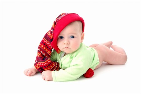 simsearch:400-05041038,k - a little baby in a large red hut portrait isolated on white Foto de stock - Super Valor sin royalties y Suscripción, Código: 400-04478059