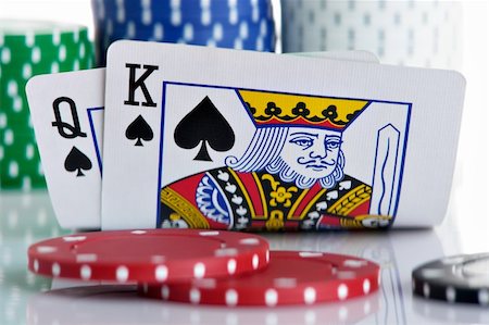 queen of hearts playing card - King and Queen pocket with chips in the background Stock Photo - Budget Royalty-Free & Subscription, Code: 400-04478086