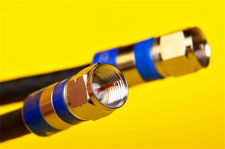 Two Coax cables on yellow background Stock Photo - Budget Royalty-Free & Subscription, Code: 400-04478296