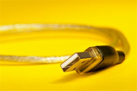 USB cable on yellow background Stock Photo - Budget Royalty-Free & Subscription, Code: 400-04478298