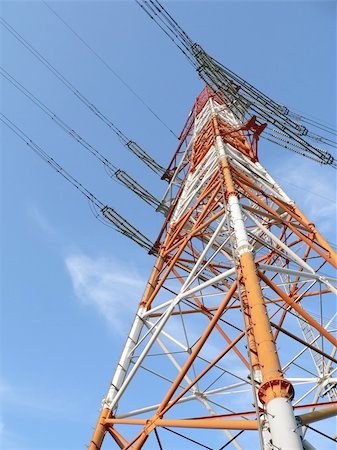high-rise industrial electricity pylon over clear blue sky Stock Photo - Budget Royalty-Free & Subscription, Code: 400-04479063