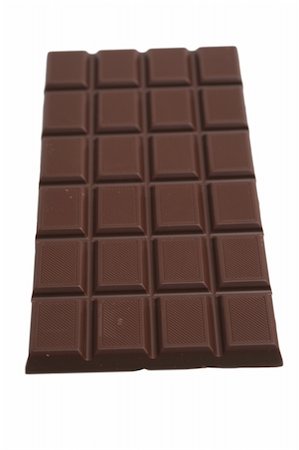 Tile of tasty chocolate on a white background Stockbilder - Microstock & Abonnement, Bildnummer: 400-04479192