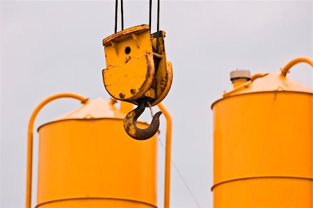 sandy hook - Yellow hook and gravel silos in a building site Stock Photo - Budget Royalty-Free & Subscription, Code: 400-04479255