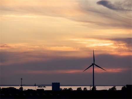 portrait of wind turbine in beautiful sunset Stock Photo - Budget Royalty-Free & Subscription, Code: 400-04479369