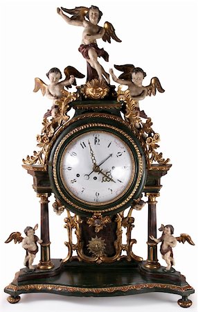 simsearch:700-00650072,k - An antique clock with figurines of cupids Photographie de stock - Aubaine LD & Abonnement, Code: 400-04479413