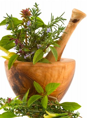 simsearch:400-04544414,k - Healing herbs and edible flowers (handcarved olive tree mortar and pestle) Stock Photo - Budget Royalty-Free & Subscription, Code: 400-04470684