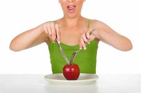 simsearch:400-05741507,k - Gorgeous woman with hungry for a tasty apple Stockbilder - Microstock & Abonnement, Bildnummer: 400-04470726