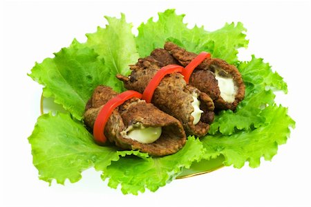 simsearch:400-04295211,k - Tasty beef-rolls with lettuce on plate . Isolated. Fotografie stock - Microstock e Abbonamento, Codice: 400-04470761