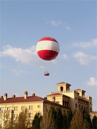 Hot air balloon and building Victorian style. The vintage version with grain added for a realistic effect, anvil effect Film speed 25ASA, film type slide2,BW warm filter, effect softener. Stock Photo - Budget Royalty-Free & Subscription, Code: 400-04472766