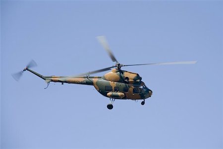 simsearch:400-07919829,k - Mi-2 small helicopter in khaki paint Foto de stock - Super Valor sin royalties y Suscripción, Código: 400-04472934