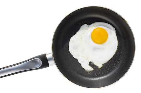 person frying eggs - Fryed egg Stock Photo - Budget Royalty-Free & Subscription, Code: 400-04473086