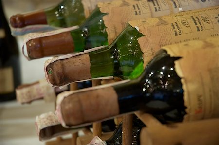 wine bottles laying in wooden rack Stock Photo - Budget Royalty-Free & Subscription, Code: 400-04473692