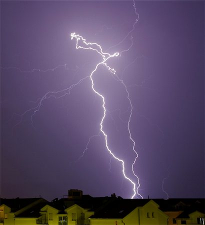 rain on roof - Lighting bolt over houses roofs Stock Photo - Budget Royalty-Free & Subscription, Code: 400-04473880