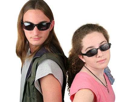 two teens with sunglasses on looking cool Stock Photo - Budget Royalty-Free & Subscription, Code: 400-04484143