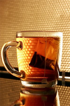 simsearch:400-04476908,k - Single glass cup with tea Stock Photo - Budget Royalty-Free & Subscription, Code: 400-04484580
