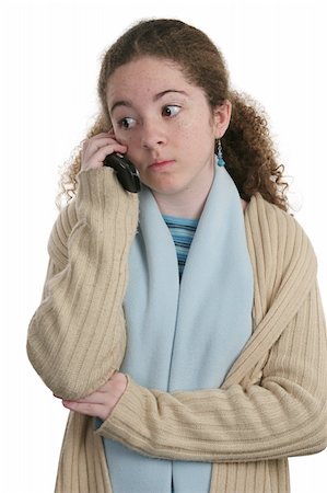 school girls talking gossip images - A teen girl talking on the phone, with a surprised expression.  Isolated. Stock Photo - Budget Royalty-Free & Subscription, Code: 400-04484771