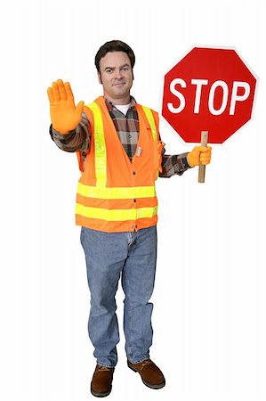 directing traffic - A friendly school crossing guard holding a stop sign.  Full body solated on white. Stock Photo - Budget Royalty-Free & Subscription, Code: 400-04485169
