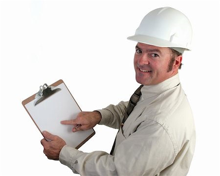 A construction supervisor happy, pointing out a good report - isolated Stock Photo - Budget Royalty-Free & Subscription, Code: 400-04485161