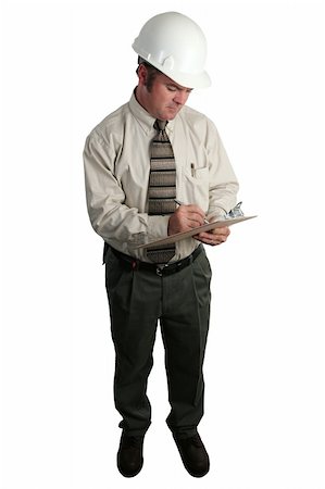 simsearch:400-05714957,k - a complete view of an engineer taking notes on a clipboard Stock Photo - Budget Royalty-Free & Subscription, Code: 400-04485203