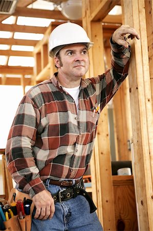 simsearch:400-05021207,k - A construction worker looking into the distance with a thoughtful expression. Foto de stock - Super Valor sin royalties y Suscripción, Código: 400-04485266